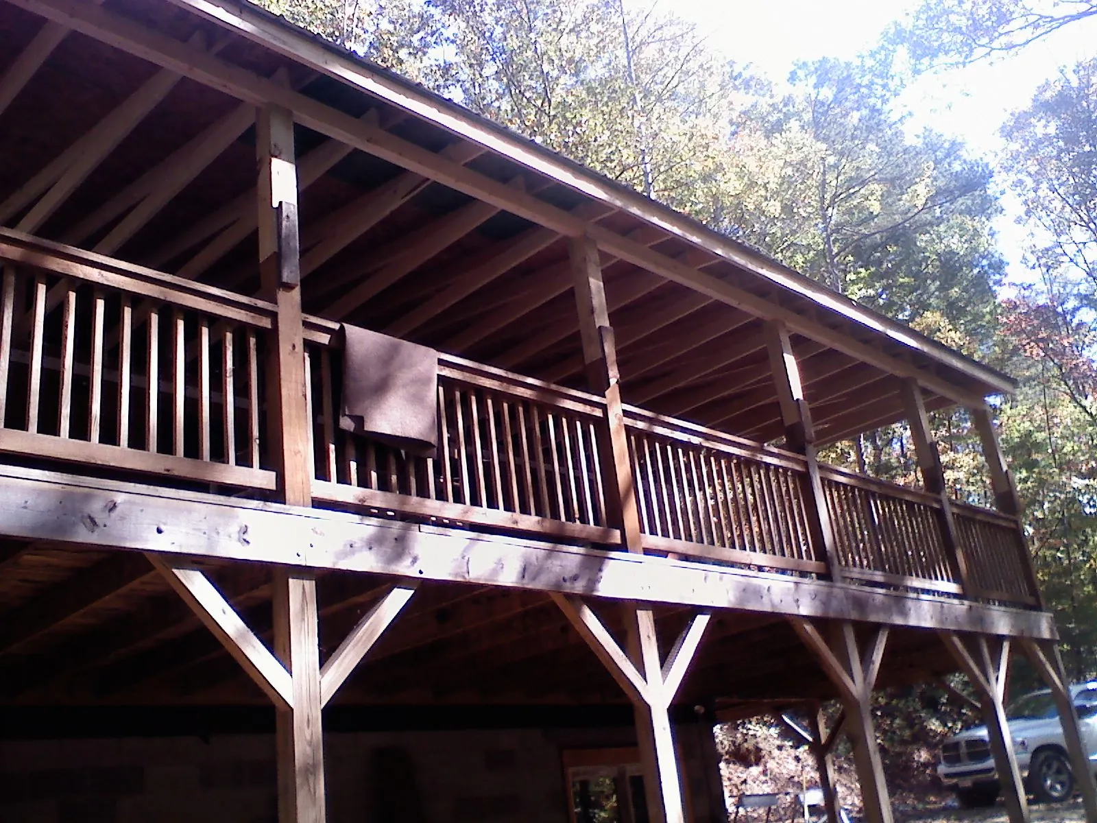 Timber framing under a new elevated porch and deck — Roof Leak Repair in Shedd by Roofing Brothers